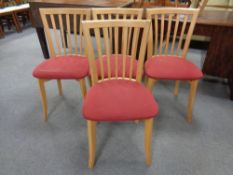 A set of four contemporary dining chairs