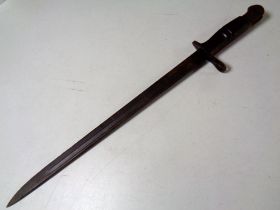 A First World War Remington bayonet dated 1913,