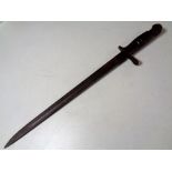 A First World War Remington bayonet dated 1913,