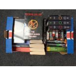 A box of books including The Lord of the Rings,