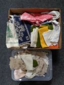 Two boxes containing 20th century table linens