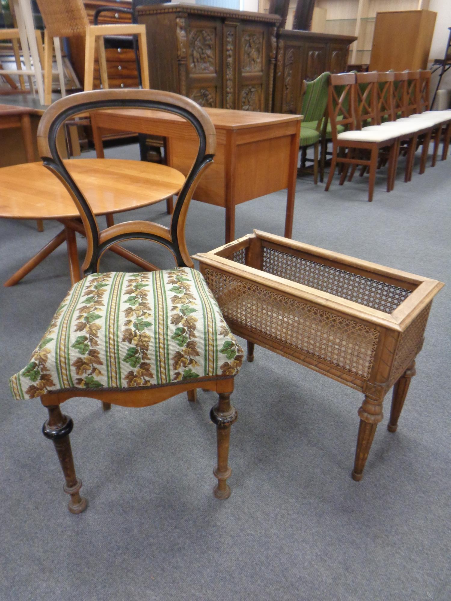 A beech and cane planter with a beech and ebonised bedroom chair