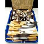 A tray of boxed and unboxed stainless steel and EPNS flatware