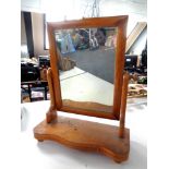 A Victorian pine dressing table mirror