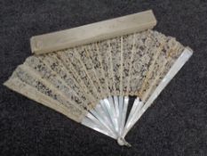 A Victorian lace and mother-of-pearl hand fan in box
