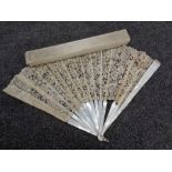 A Victorian lace and mother-of-pearl hand fan in box