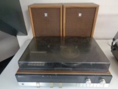 A Sanyo stereo music system G2411KL together with a pair of teak cased Sanyo speakers