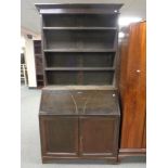 A 19th century bureau bookcase fitted with cupboards