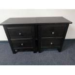 A pair of stained ash two drawer bedside cabinets