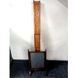 A Victorian dressing table mirror with an inlaid pediment