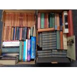 Two boxes containing assorted books including volumes by Rudyard Kipling and Charles Dickens