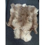 A deerskin rug