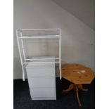 A contemporary three drawer chest together with a pine octagonal table and painted towel rail