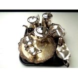 A tray of stainless steel tea set, silver plated circular tray,