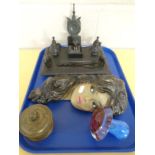 A tray containing an Art Deco chalk wall mask female, an Edwardian ebonised desk stand,