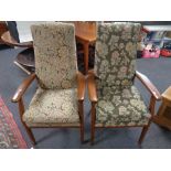 Two beech framed Parker Knoll armchairs in floral tapestry fabric