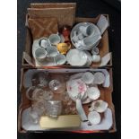 Two boxes containing glassware including decanter, mantel clock,