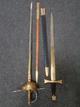 Two ornamental Spanish swords in sheathes