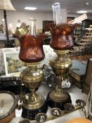 A pair of brass oil lamps (converted to electricity)