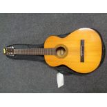 A German made Resonata acoustic guitar in soft carry case