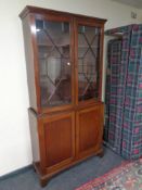 A Victorian mahogany astral glazed double door bookcase