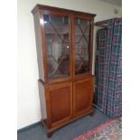 A Victorian mahogany astral glazed double door bookcase