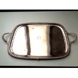 A large silver plated twin handled serving tray,