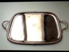 A large silver plated twin handled serving tray,