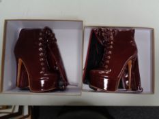 A pair of Onlymaker Burgundy painted leather stiletto boots (size US 8)