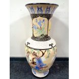 A large oriental style glazed pottery baluster vase,