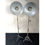 A pair of 20th century metal tripod standard lamps