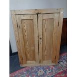A Victorian pine double door kitchen cupboard