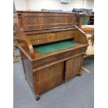 A 19th century inlaid mahogany roll-top writing bureau