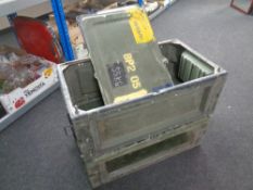 Two metal military storage crates with two spare lids