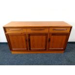 A 20th century teak low sideboard