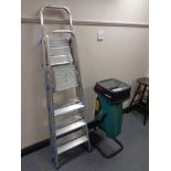 A Bosch garden shredder together with two folding aluminium step ladders