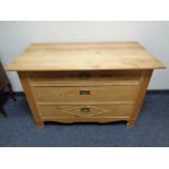 A 19th century pine chest of three drawers