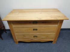 A 19th century pine chest of three drawers