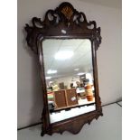 A George I style walnut and gilt mirror bearing carved date 1716 to reverse