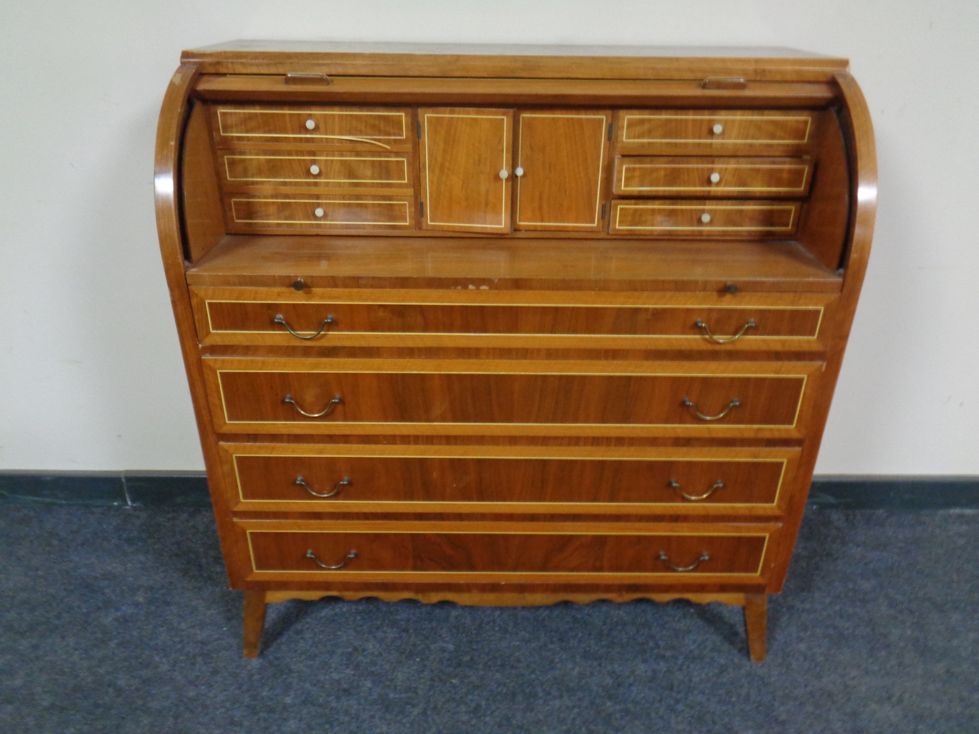 A continental beech cylinder front writing bureau