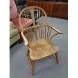 An early 20th century oak spindle back kitchen chair