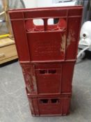 Three Scottish and Newcastle brewery crates