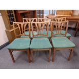 A set of six oak continental dining chairs