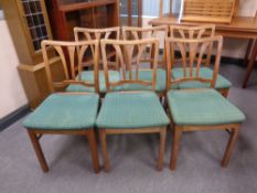 A set of six oak continental dining chairs