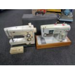 A 20th century Singer sewing machine in case together with a Frister Rossmann 906 sewing machine.