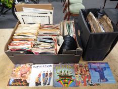 A record box and a further box containing vinyl 7 inch singles and 78s including 1950s onwards The
