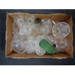 A box containing assorted glassware including bowls, a basket, a paperweight, drinking glasses etc.