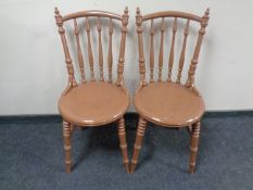 A pair of painted Ibex chairs.