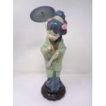 A Lladro figure - Geisha with parasol.