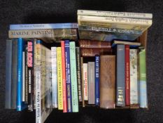 A box of books relating to art, British birds, painting and military aviation.